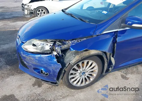 2012 Ford Focus Titanium z USA, uszkodzony, nr VIN 1FAHP3J29CL476496